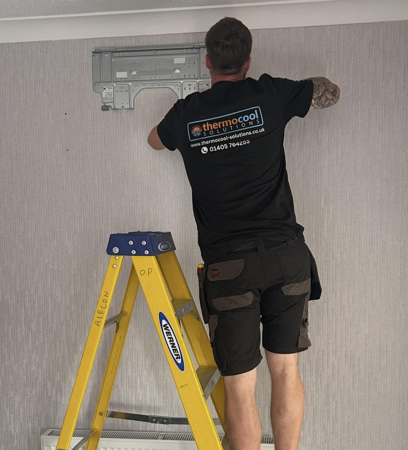 thermocool air conditioner installer installing air conditioning unit