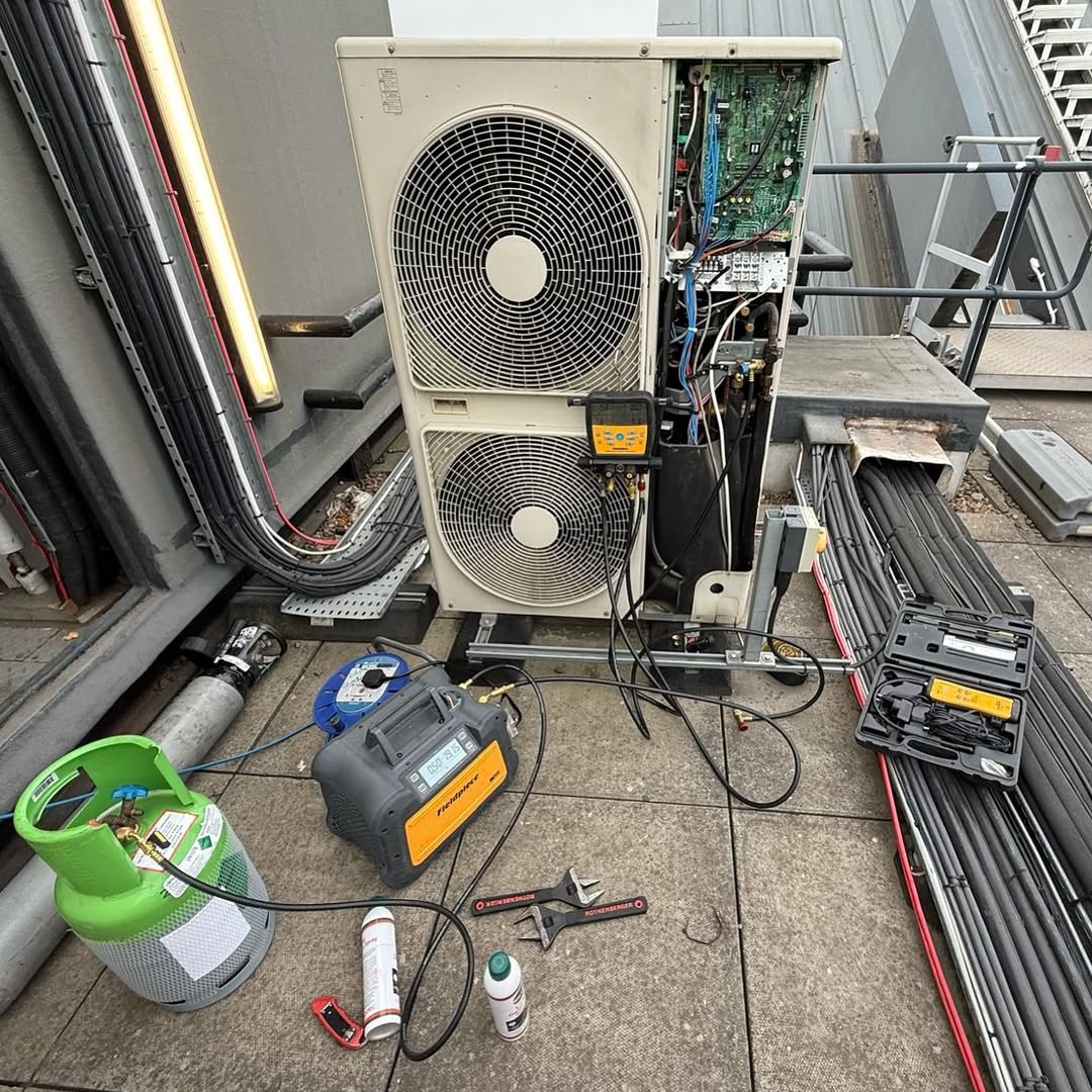 pressure test and repair a refrigerant leak at a college in Leeds
